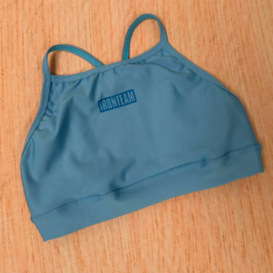 Top tira Triada cielo